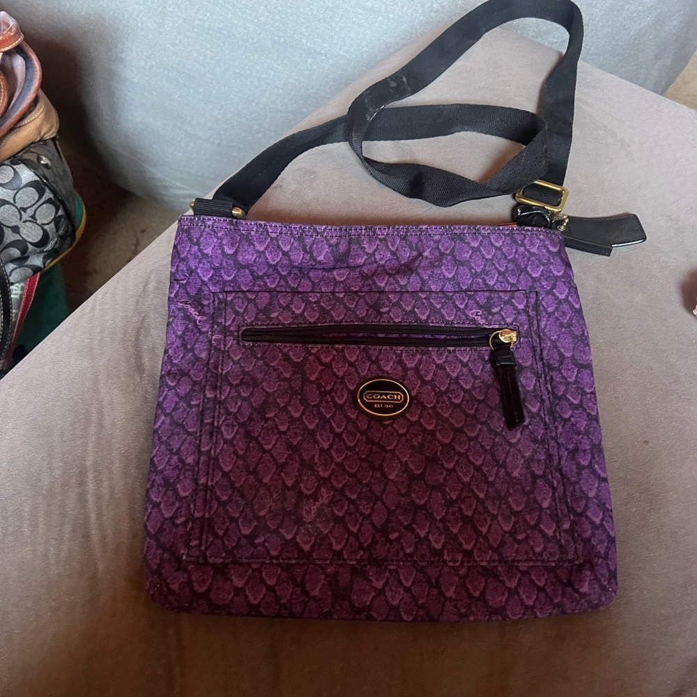 Purple snake skin appearance Coach crossbody